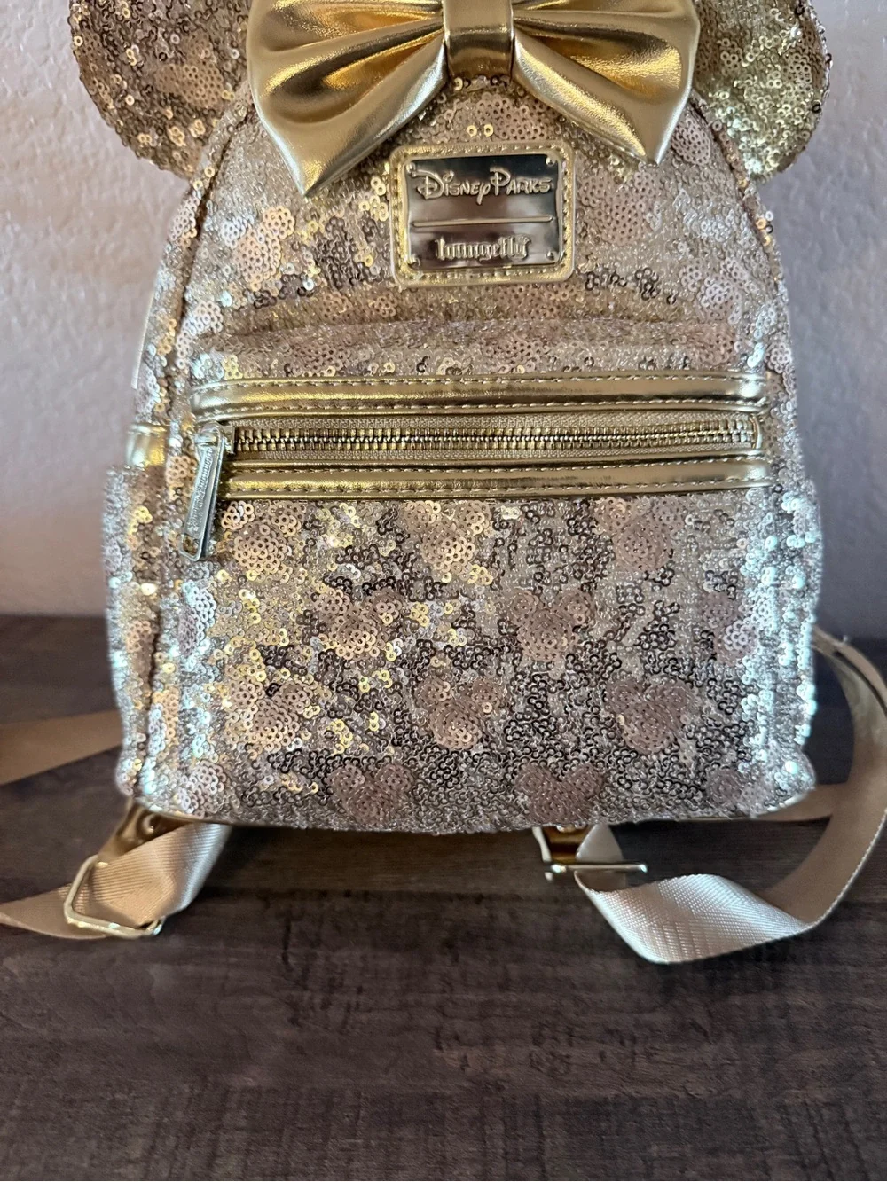 Loungefly Disney gold sequin backpack with hidden mickeys